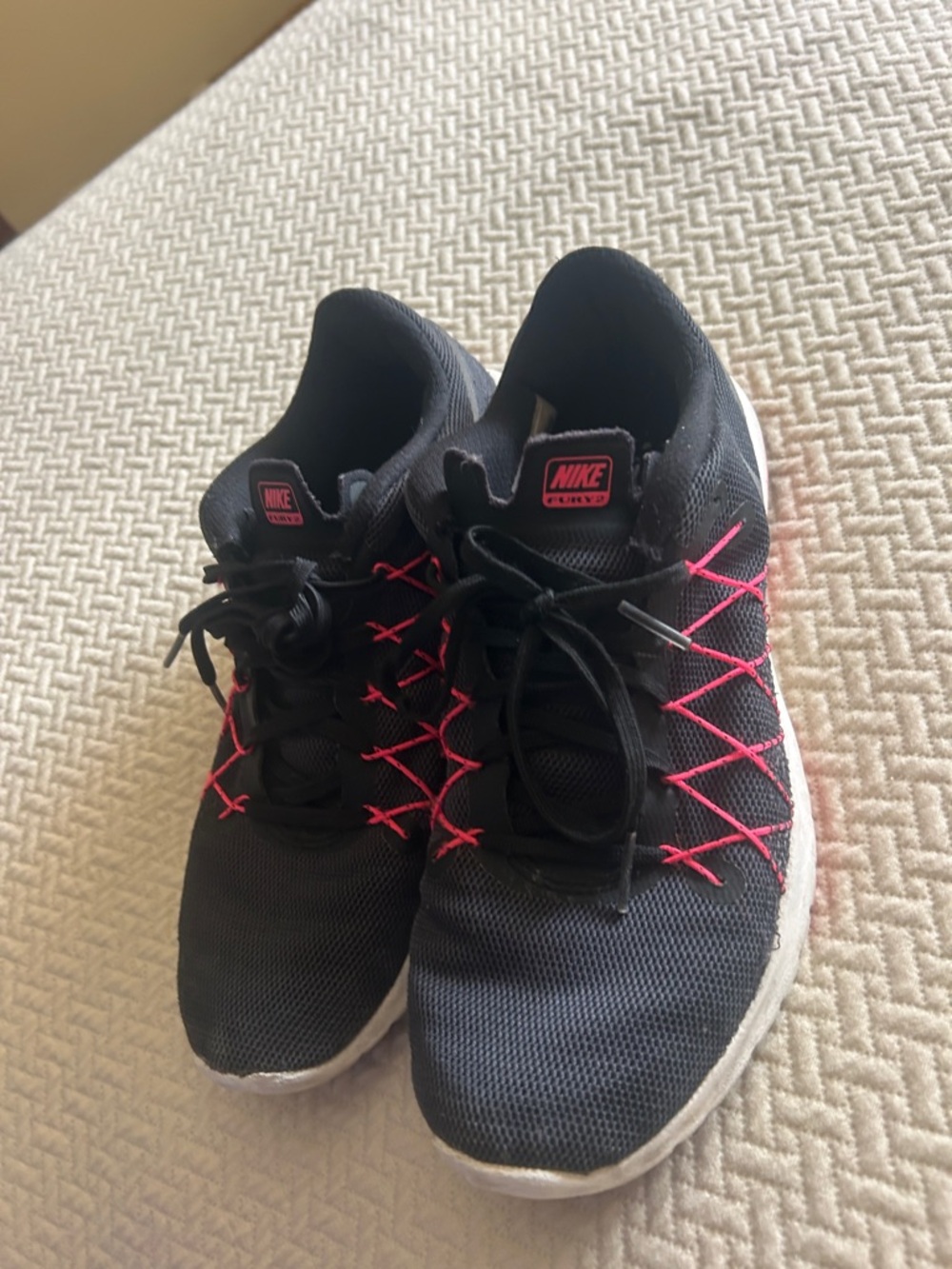 Nike Black Athletic Shoes with Pink Accents